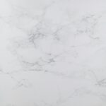 White marble texture with subtle gray veins, perfect for design backgrounds.